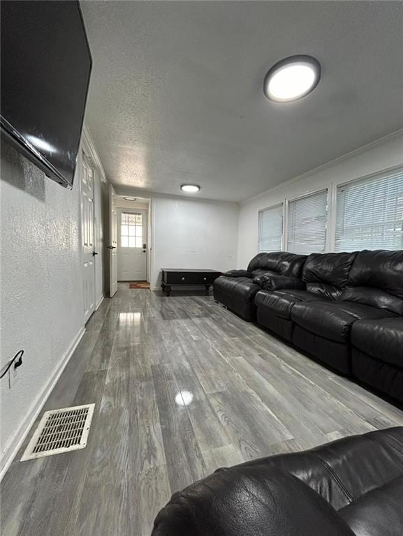 4123 E 6th St, Kansas City, MO 64124 - living area with wood finished floors and baseboards