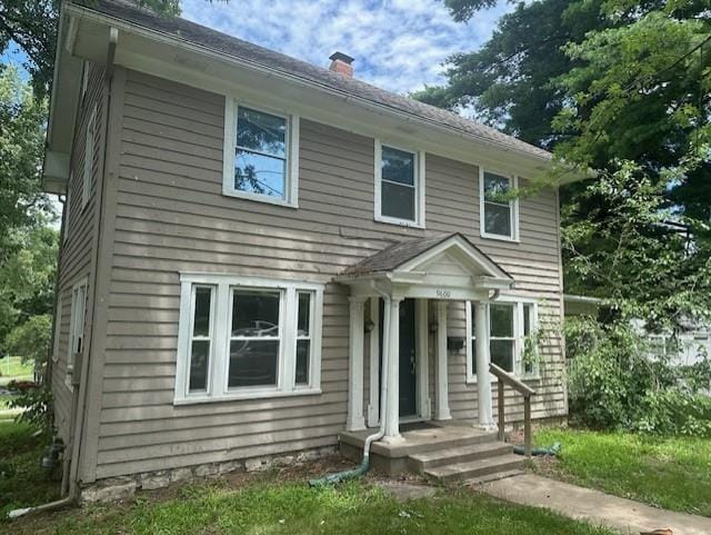 9600 E 16th St, Independence, MO 64052 - view of front facade with a chimney