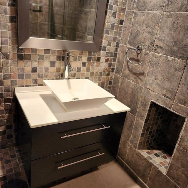 9318 Greenway Ln, Lenexa, KS 66215 - bathroom featuring tile walls, vanity, and tile patterned flooring