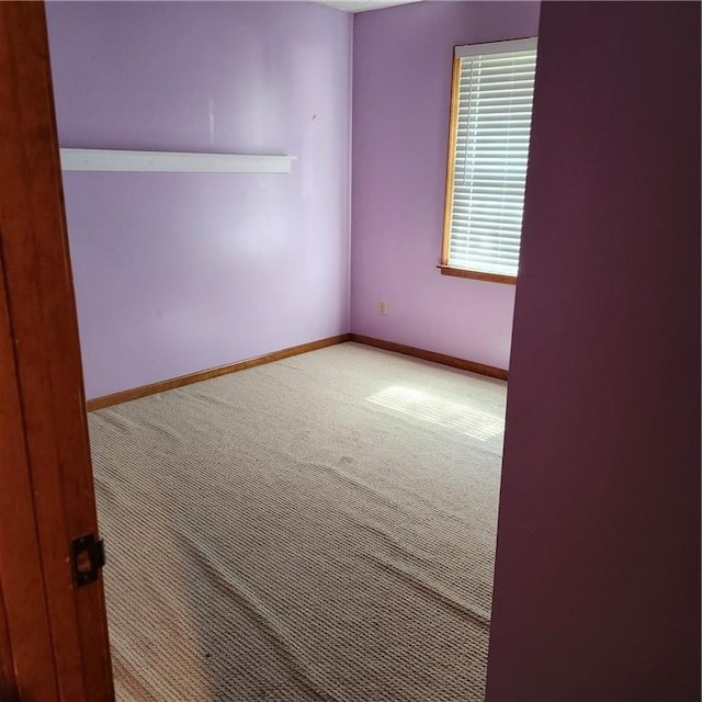 9318 Greenway Ln, Lenexa, KS 66215 - unfurnished room with carpet floors and baseboards