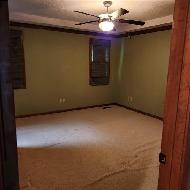 9318 Greenway Ln, Lenexa, KS 66215 - unfurnished room featuring a ceiling fan and carpet