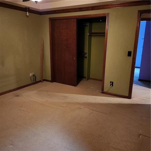 9318 Greenway Ln, Lenexa, KS 66215 - unfurnished bedroom featuring light colored carpet and a closet