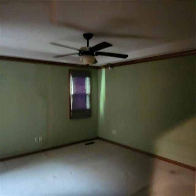 9318 Greenway Ln, Lenexa, KS 66215 - spare room featuring a ceiling fan and baseboards
