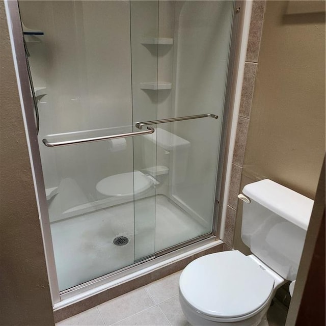 9318 Greenway Ln, Lenexa, KS 66215 - full bathroom featuring a shower stall and tile patterned flooring