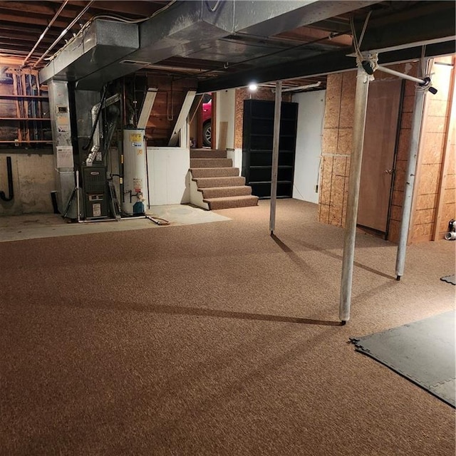 9318 Greenway Ln, Lenexa, KS 66215 - unfinished basement with gas water heater, heating unit, stairs, and carpet floors