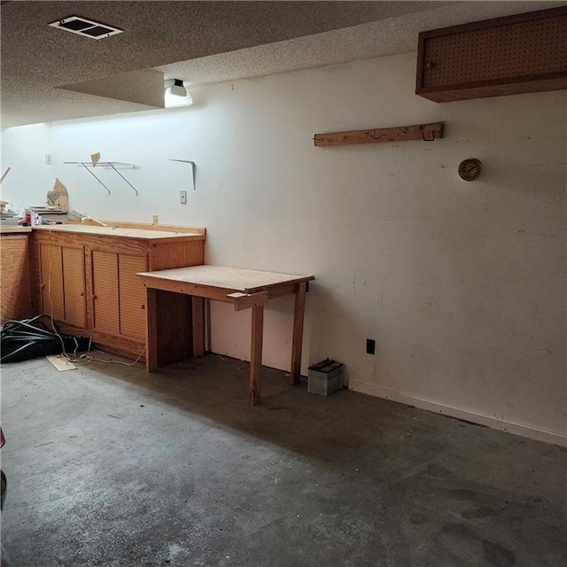 9318 Greenway Ln, Lenexa, KS 66215 - basement featuring a workshop area