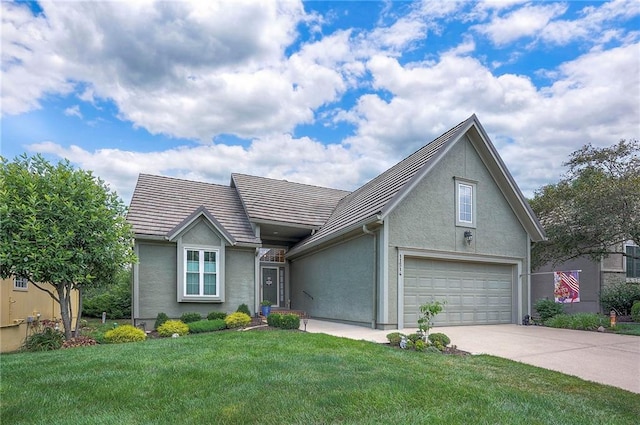 11514 W 143rd Ter, Olathe, KS 66062 - traditional-style house featuring stucco siding, a garage, driveway, and a front lawn
