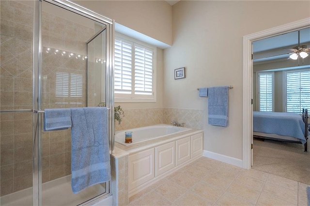 11514 W 143rd Ter, Olathe, KS 66062 - ensuite bathroom with a garden tub, tile patterned flooring, plenty of natural light, and a stall shower