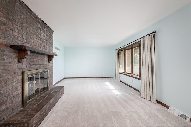 20723 Kissinger Rd, Tonganoxie, KS 66086 - unfurnished living room featuring light carpet and a brick fireplace