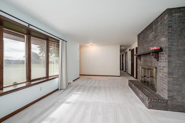 20723 Kissinger Rd, Tonganoxie, KS 66086 - unfurnished living room featuring a fireplace and carpet flooring