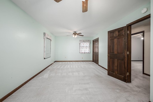 20723 Kissinger Rd, Tonganoxie, KS 66086 - spare room featuring a ceiling fan, light carpet, and a smoke detector