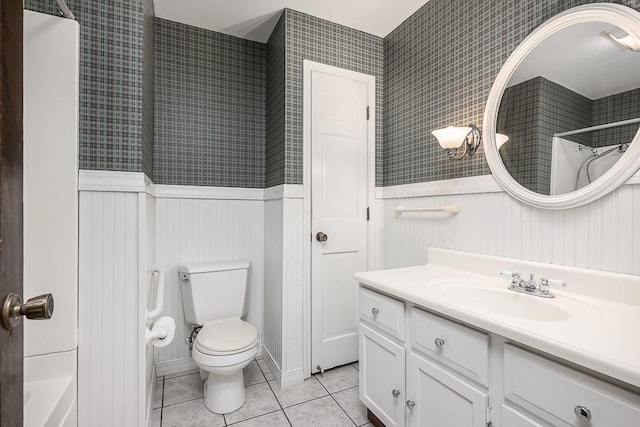 20723 Kissinger Rd, Tonganoxie, KS 66086 - full bathroom with vanity, tile patterned floors, wainscoting, and shower / bath combination