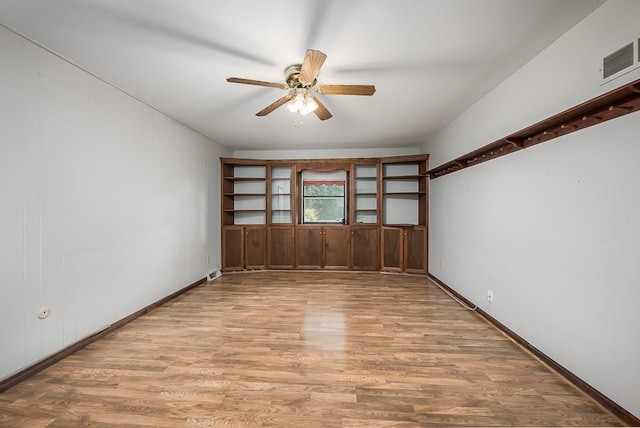 20723 Kissinger Rd, Tonganoxie, KS 66086 - unfurnished room with light wood-style flooring and a ceiling fan