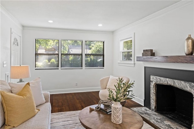 5409 Brooklyn Ave, Kansas City, MO 64130 - living room featuring wood finished floors, a premium fireplace, crown molding, and recessed lighting