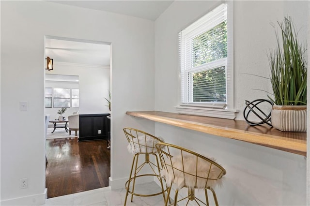 5409 Brooklyn Ave, Kansas City, MO 64130 - kitchen with baseboards and crown molding