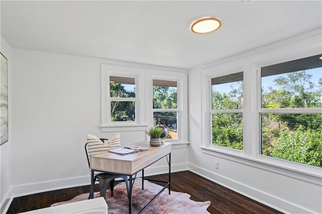 5409 Brooklyn Ave, Kansas City, MO 64130 - office area featuring baseboards and dark wood-style floors