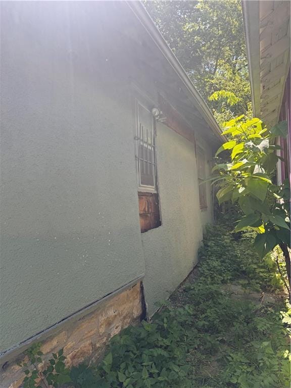 4308 Paseo Blvd, Kansas City, MO 64110 - view of home's exterior featuring stucco siding