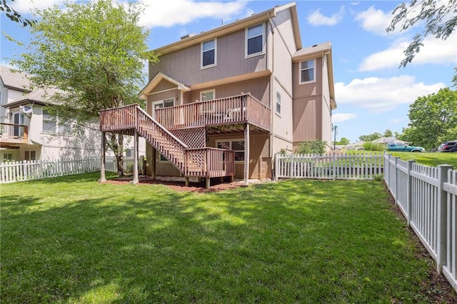 701 Redbud Dr, Paola, KS 66071 - rear view of house with a fenced backyard, a deck, and stairway