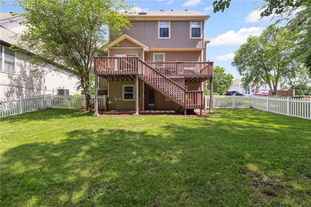 701 Redbud Dr, Paola, KS 66071 - rear view of property with a deck, a fenced backyard, and stairs