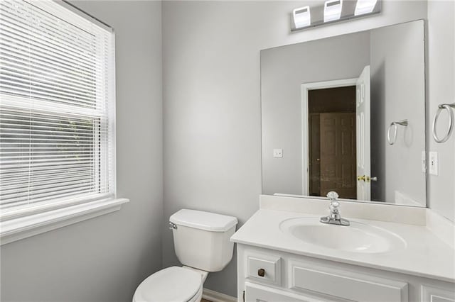 701 Redbud Dr, Paola, KS 66071 - half bathroom with toilet and vanity