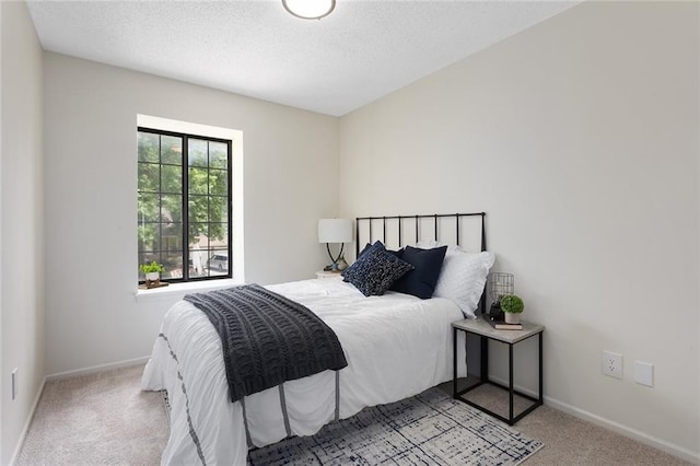 404 SE Bristol Dr, Lees Summit, MO 64063 - bedroom with carpet flooring and a textured ceiling