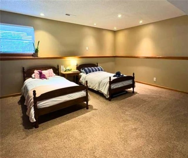 1720 SE Kenwood Dr, Blue Springs, MO 64014 - carpeted bedroom with a textured ceiling and recessed lighting