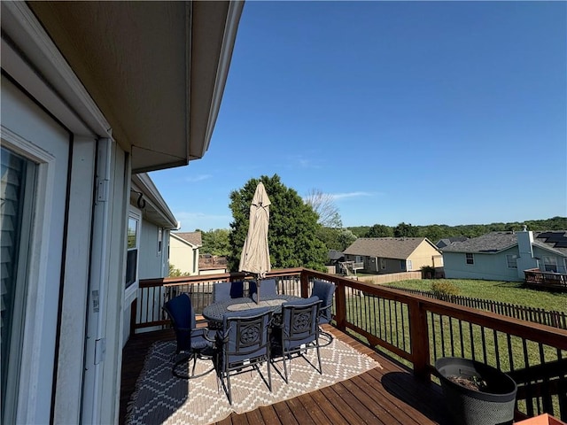 1720 SE Kenwood Dr, Blue Springs, MO 64014 - wooden terrace with outdoor dining space and a residential view