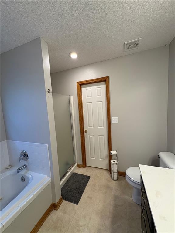 1720 SE Kenwood Dr, Blue Springs, MO 64014 - bathroom with vanity, a textured ceiling, a garden tub, and a stall shower