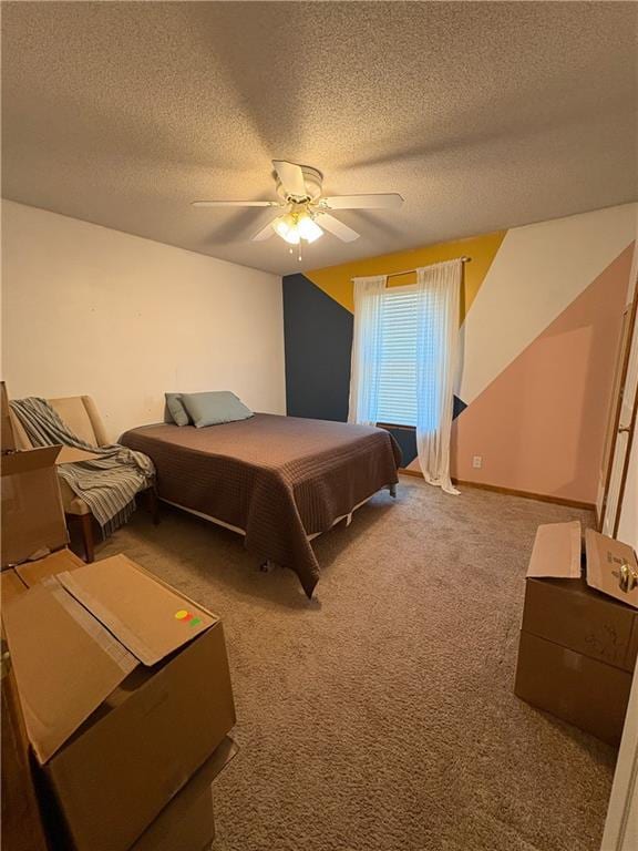 1720 SE Kenwood Dr, Blue Springs, MO 64014 - bedroom with a textured ceiling, carpet flooring, and ceiling fan