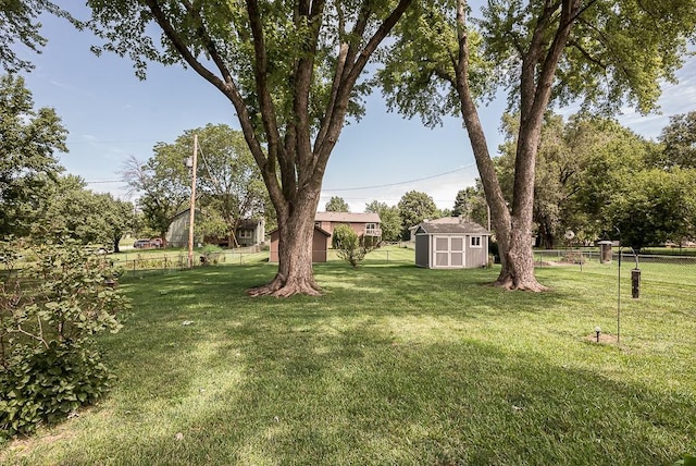 15714 Leavenworth Rd, Basehor, KS 66007 - fenced backyard featuring a storage unit