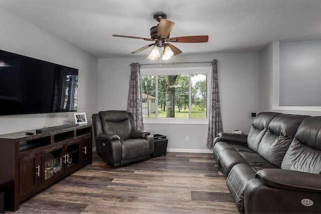 15714 Leavenworth Rd, Basehor, KS 66007 - living room featuring a ceiling fan and dark wood-type flooring
