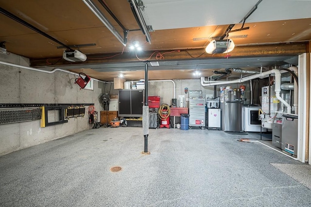 15714 Leavenworth Rd, Basehor, KS 66007 - garage featuring a garage door opener and gas water heater