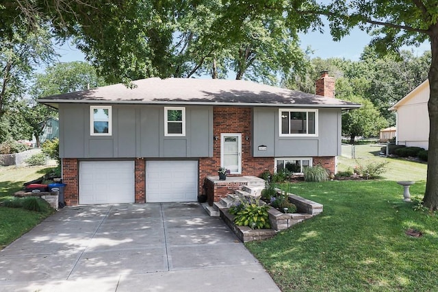 15714 Leavenworth Rd, Basehor, KS 66007 - bi-level home with a front lawn, driveway, a chimney, brick siding, and a garage