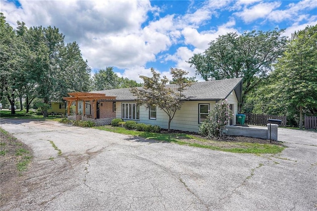 9730 State Line Rd, Leawood, KS 66206 - ranch-style home with a pergola