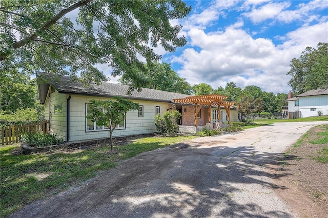 9730 State Line Rd, Leawood, KS 66206 - view of front of property with a pergola and driveway