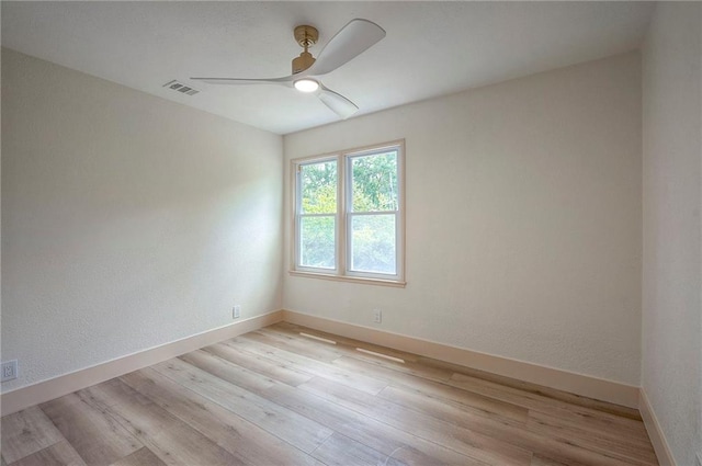 9730 State Line Rd, Leawood, KS 66206 - spare room featuring a ceiling fan and light wood-type flooring