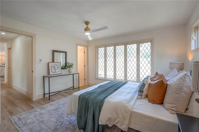 9730 State Line Rd, Leawood, KS 66206 - bedroom featuring wood finished floors and ceiling fan
