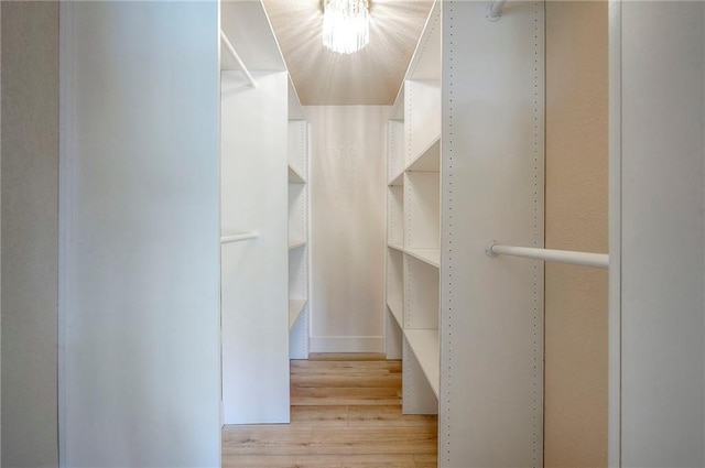 9730 State Line Rd, Leawood, KS 66206 - walk in closet with light wood finished floors