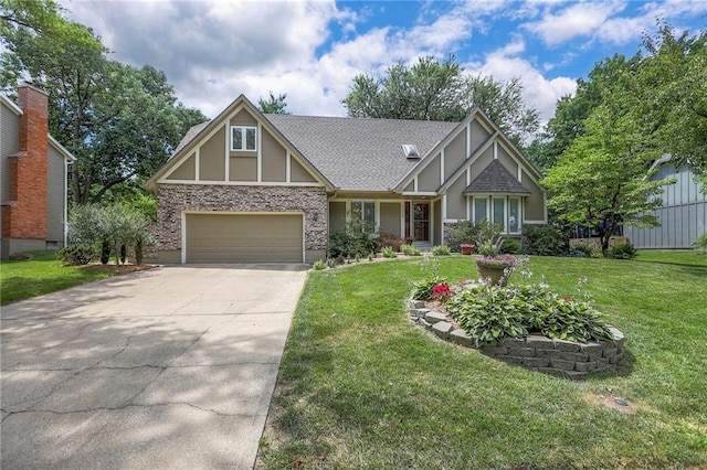 11512 Hadley St, Overland Park, KS 66210 - tudor home with concrete driveway, a front lawn, a shingled roof, and stucco siding