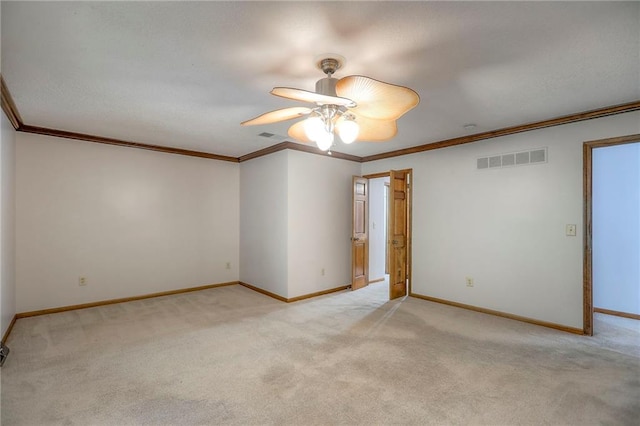 11512 Hadley St, Overland Park, KS 66210 - empty room featuring light colored carpet, crown molding, and a ceiling fan