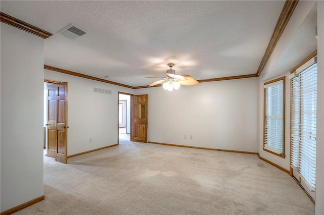 11512 Hadley St, Overland Park, KS 66210 - empty room with light carpet, crown molding, a ceiling fan, and a textured ceiling