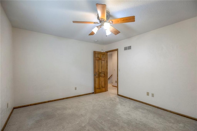 11512 Hadley St, Overland Park, KS 66210 - unfurnished room featuring light colored carpet and a ceiling fan