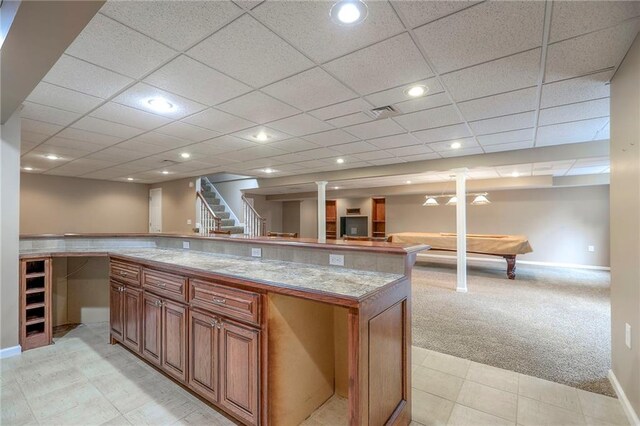 11512 Hadley St, Overland Park, KS 66210 - kitchen with light colored carpet, brown cabinets, billiards table, open floor plan, and recessed lighting