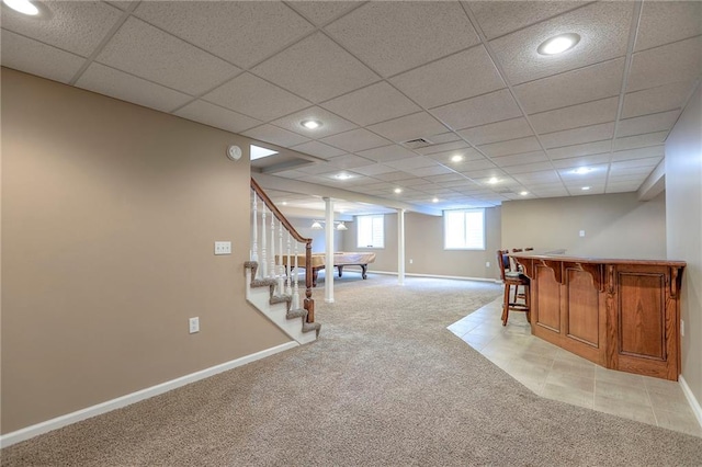 11512 Hadley St, Overland Park, KS 66210 - basement featuring light carpet, a dry bar, stairs, a drop ceiling, and recessed lighting