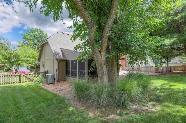 11512 Hadley St, Overland Park, KS 66210 - view of yard featuring a sunroom