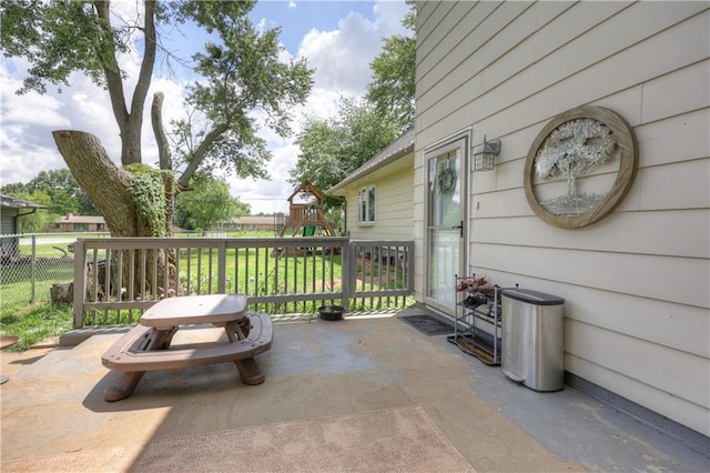 2509 E 4th St, Pittsburg, KS 66762 - view of patio / terrace with a playground