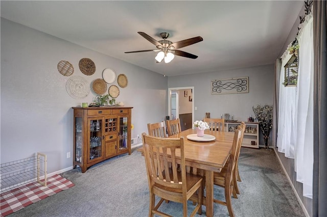 2509 E 4th St, Pittsburg, KS 66762 - carpeted dining space featuring a ceiling fan and baseboards
