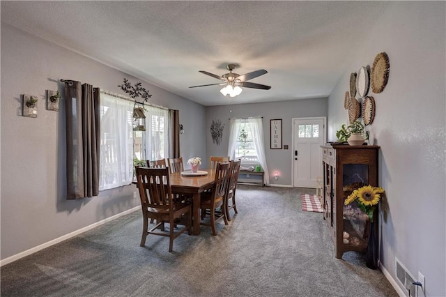 2509 E 4th St, Pittsburg, KS 66762 - carpeted dining area with ceiling fan and a textured ceiling