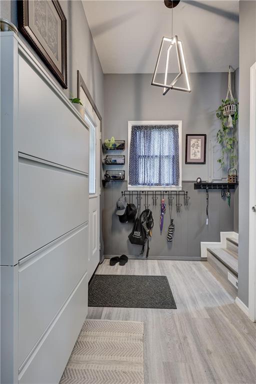 2509 E 4th St, Pittsburg, KS 66762 - bathroom featuring wood finished floors