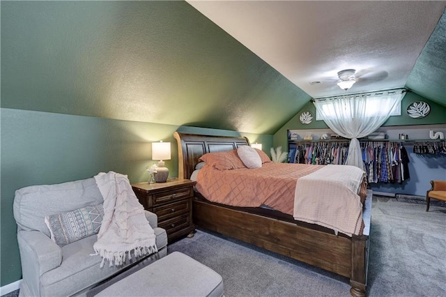 2509 E 4th St, Pittsburg, KS 66762 - carpeted bedroom with a textured ceiling and vaulted ceiling
